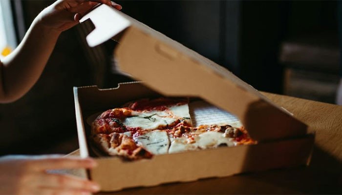 A person who ordered hundreds of pizzas at wrong addresses has been jailed